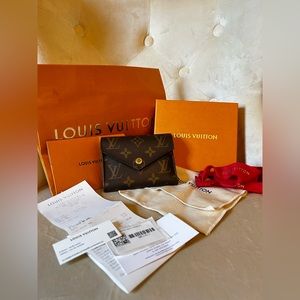 SOLD. LOUIS VUITTON Victorine Wallet in Monogram